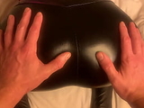 Mrs Jizz gets her ass squeezed in leather pants whilst waiting for cum